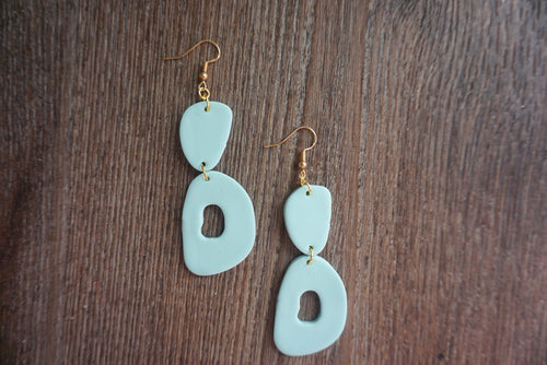 Funky sky blue oval earrings