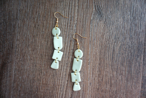 Pale blue geometric dangles