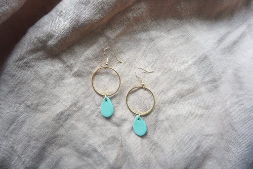 Small teal teardrops