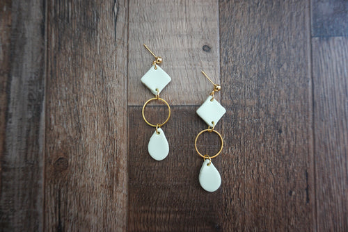 Pale blue geometric dangles