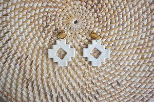 White geometric earrings