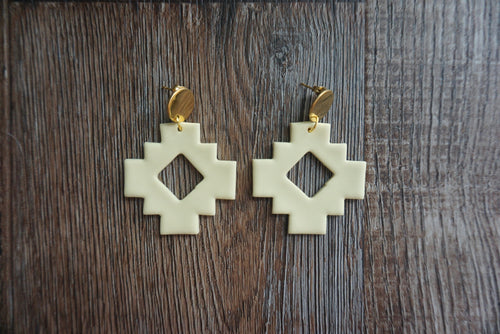 Pale yellow Aztec earrings