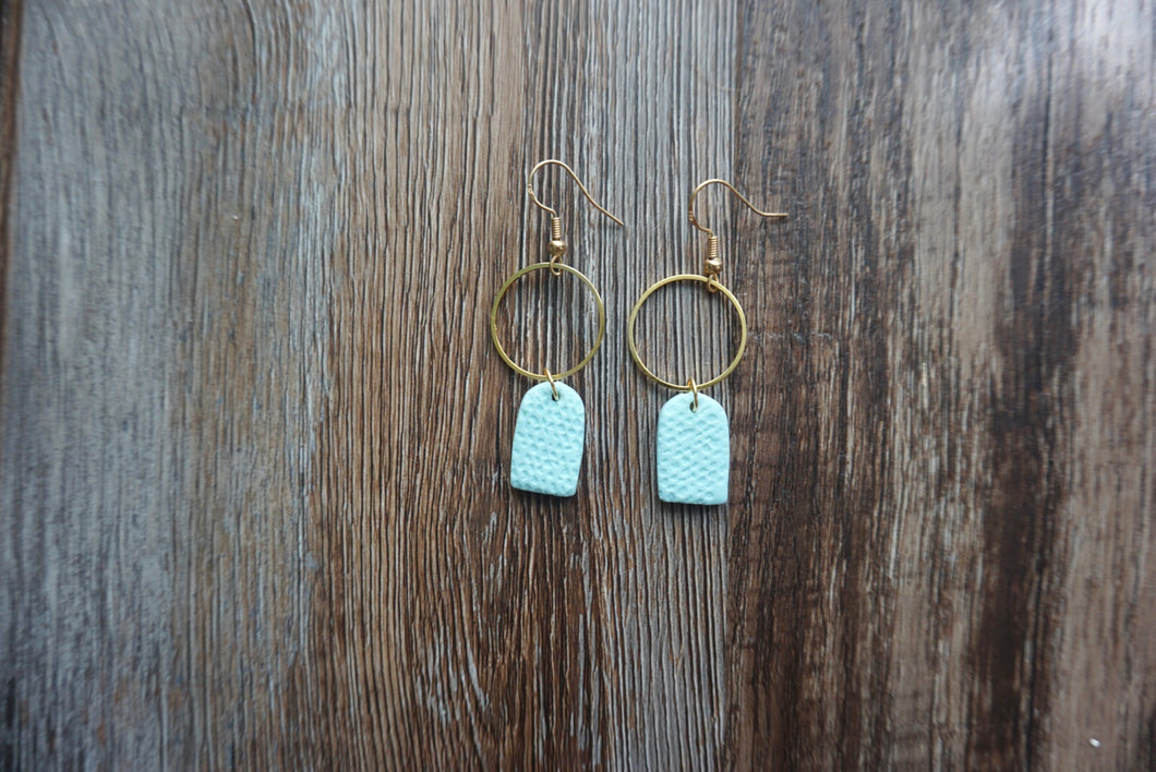 Sky blue semi-oval earrings