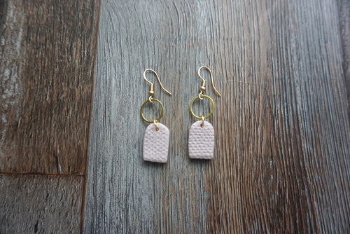 Sandy brown patterned semi-oval earrings