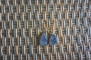 Deep blue wooden patterned oval earrings