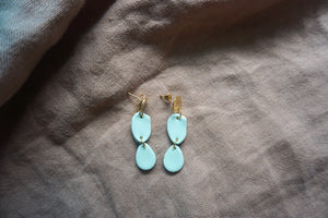 Sky blue circular earrings