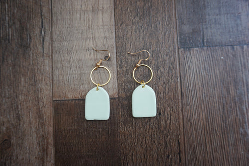 Pale blue half oval earrings