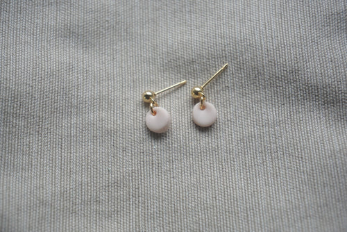 Pale pink circle studs
