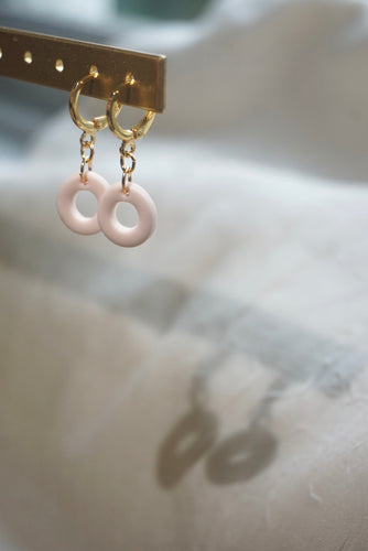 Pale pink donut dangle huggies
